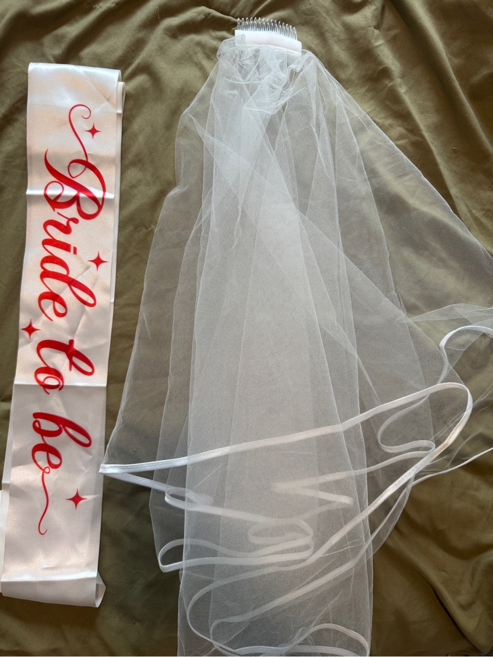 White veil & red sash